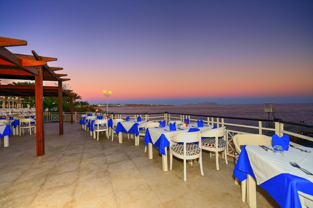 Stella Di Mare Beach Hotel&Spa Sharm el Sheikh Esterno foto Sunset at the restaurant